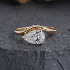 "Unique Pear Diamond Solitaire with Wavy Band"