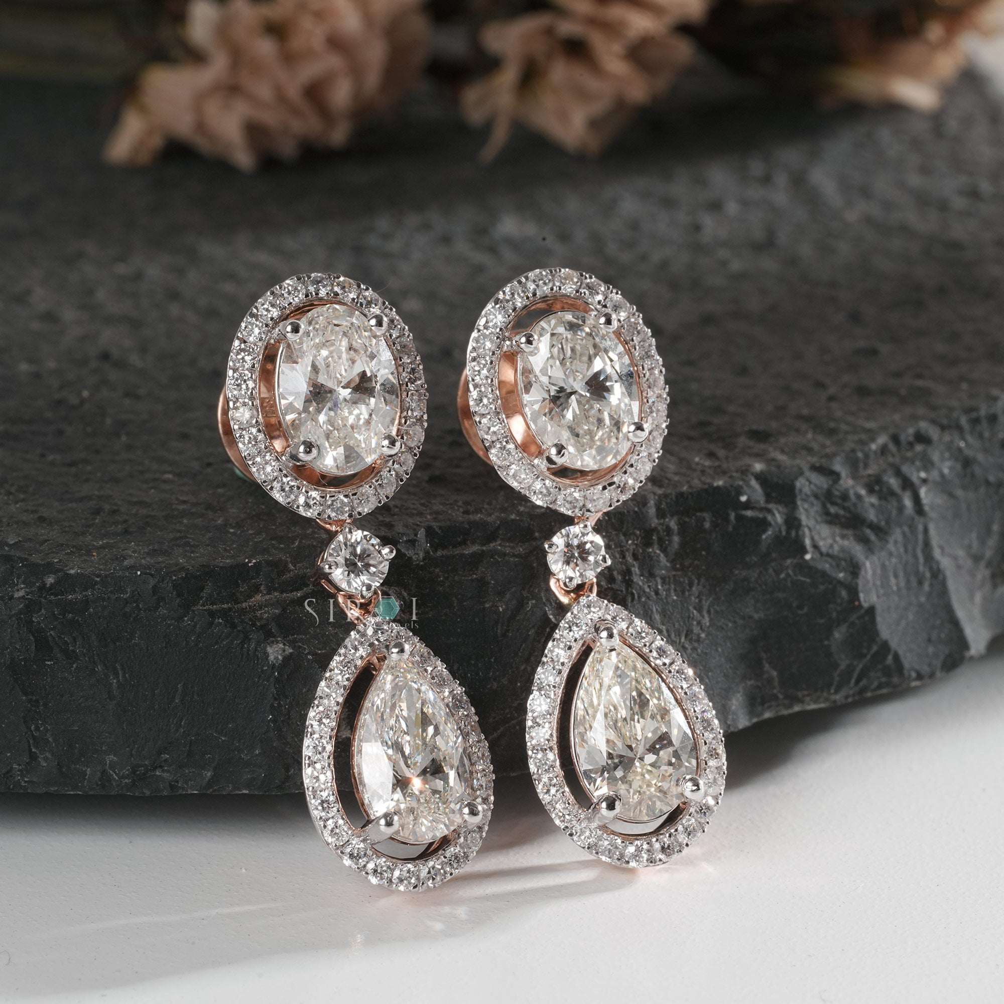The Aurora Oval & Pear Diamond Halo Drops Earrings