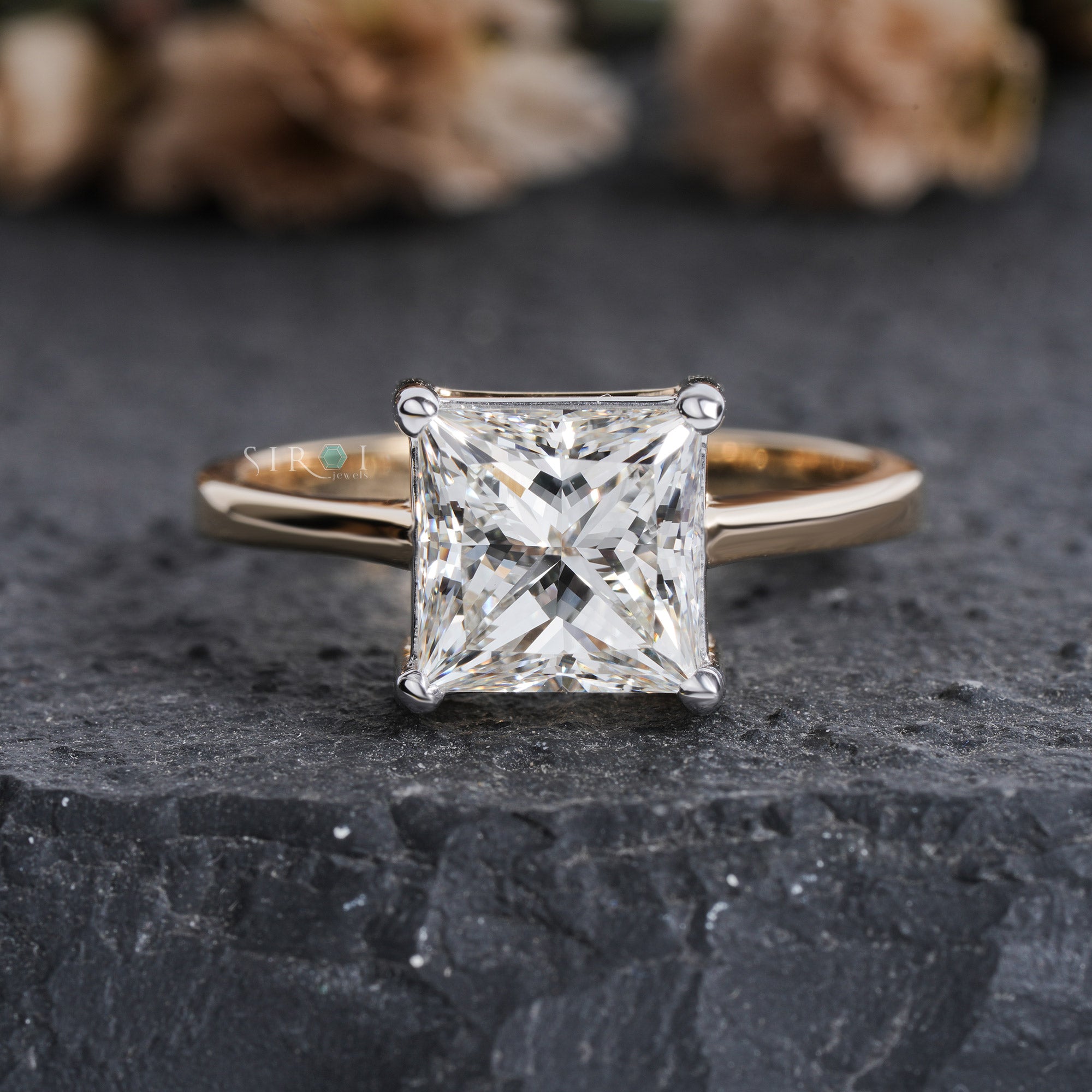 The Eternal Sparkle: Princess Cut Diamond Solitaire with Two-Tone Gold Setting