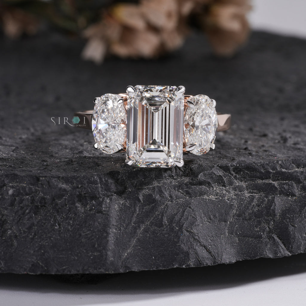 Elegant Emerald Cut & Oval Diamond Three-Stone Ring