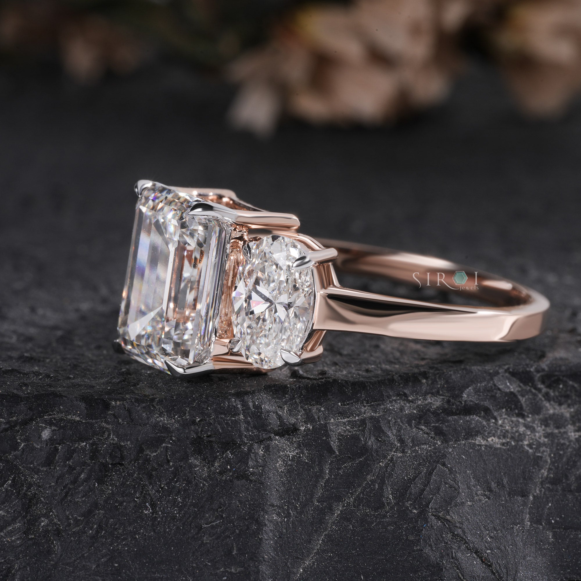 Elegant Emerald Cut & Oval Diamond Three-Stone Ring
