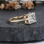 The Eternal Sparkle: Princess Cut Diamond Solitaire with Two-Tone Gold Setting