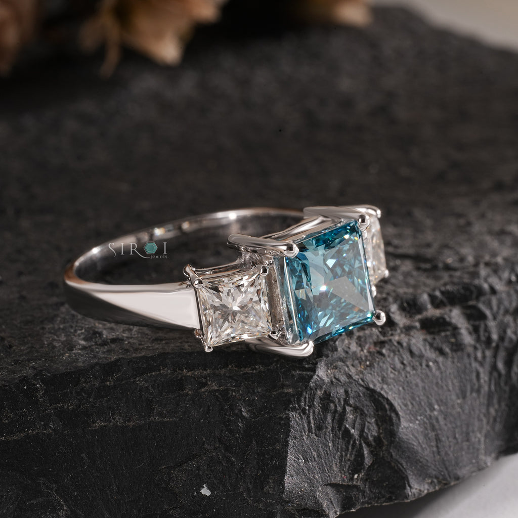 Princess Cut Blue Topaz and Diamond Three-Stone Engagement Ring in White Gold