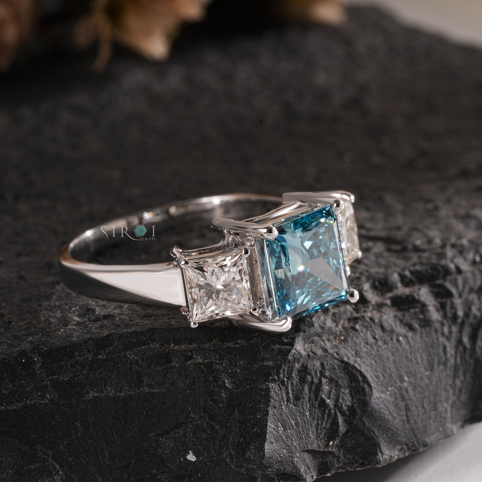 Princess Cut Blue Topaz and Diamond Three-Stone Engagement Ring in White Gold