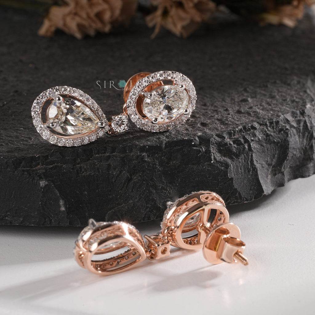 The Aurora Oval & Pear Diamond Halo Drops Earrings