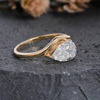 "Unique Pear Diamond Solitaire with Wavy Band"