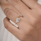 "Unique Pear Diamond Solitaire with Wavy Band"