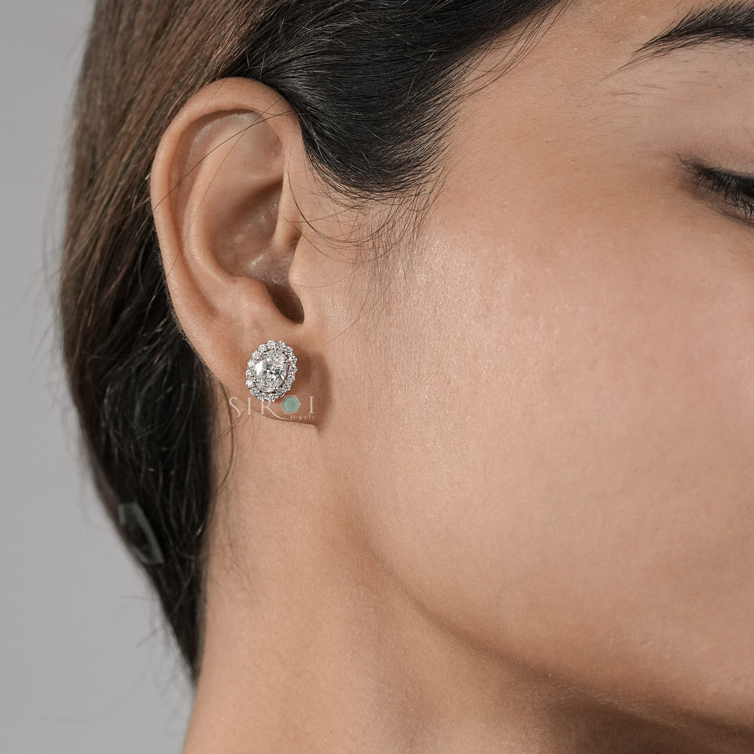 Elegant Oval Diamond Halo Stud Earrings in Two-Tone Gold
