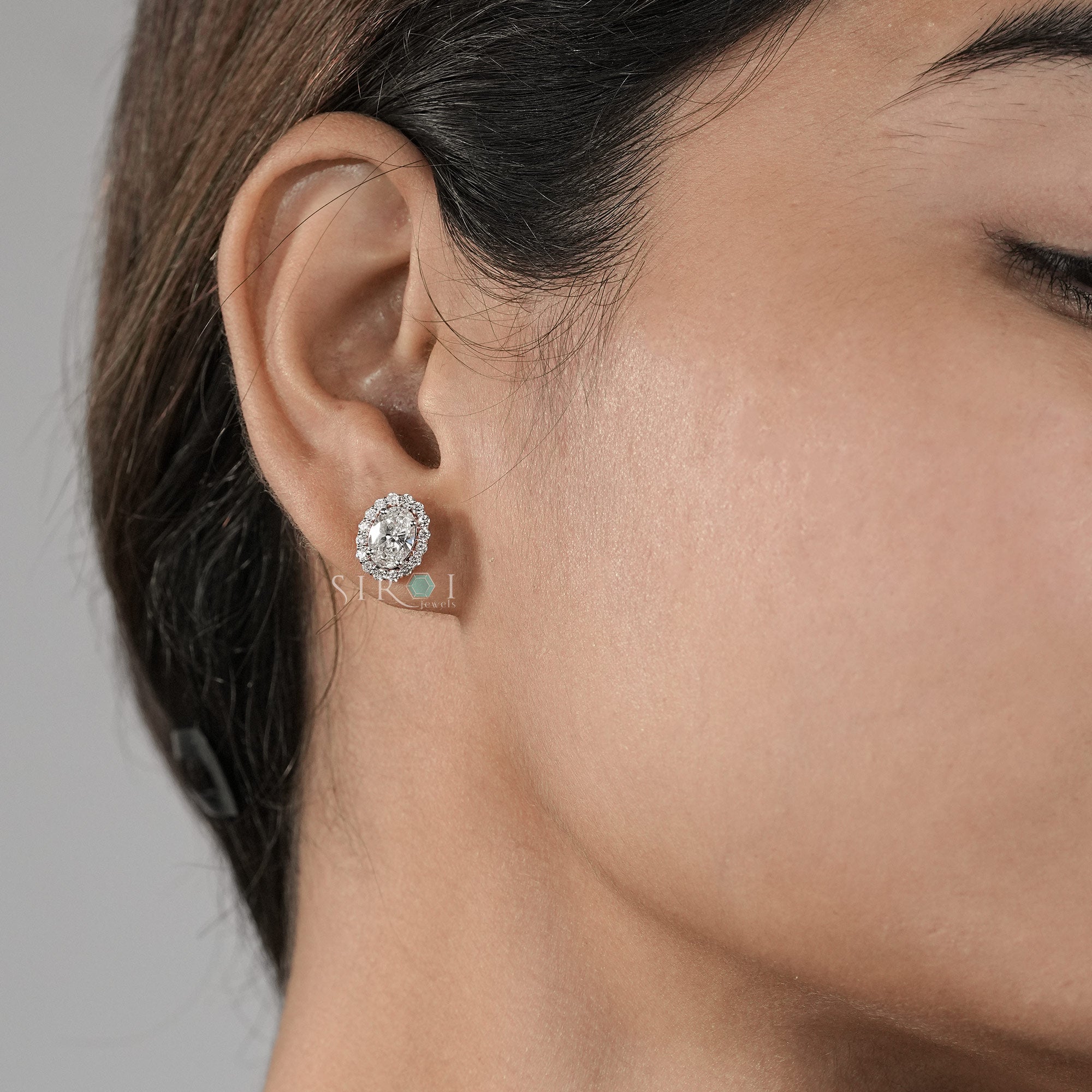 Elegant Oval Diamond Halo Stud Earrings in Two-Tone Gold