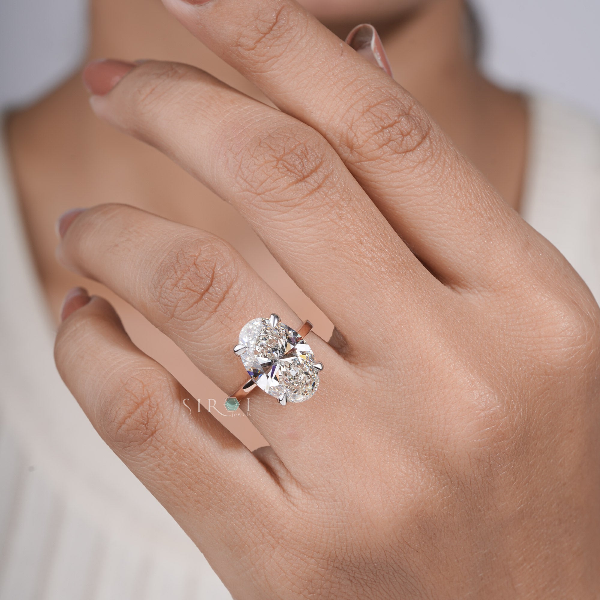 Oval Crushed Ice Solitaire Ring with Petite Claw Prongs