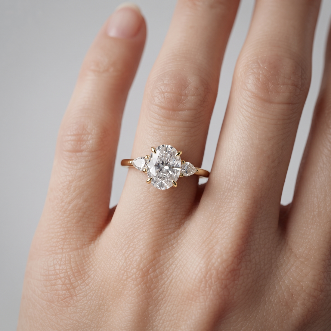 Oval Lab Grown Diamond Ring, 3-Stone Pear Side Stones, Minimalist Gold Engagement Ring