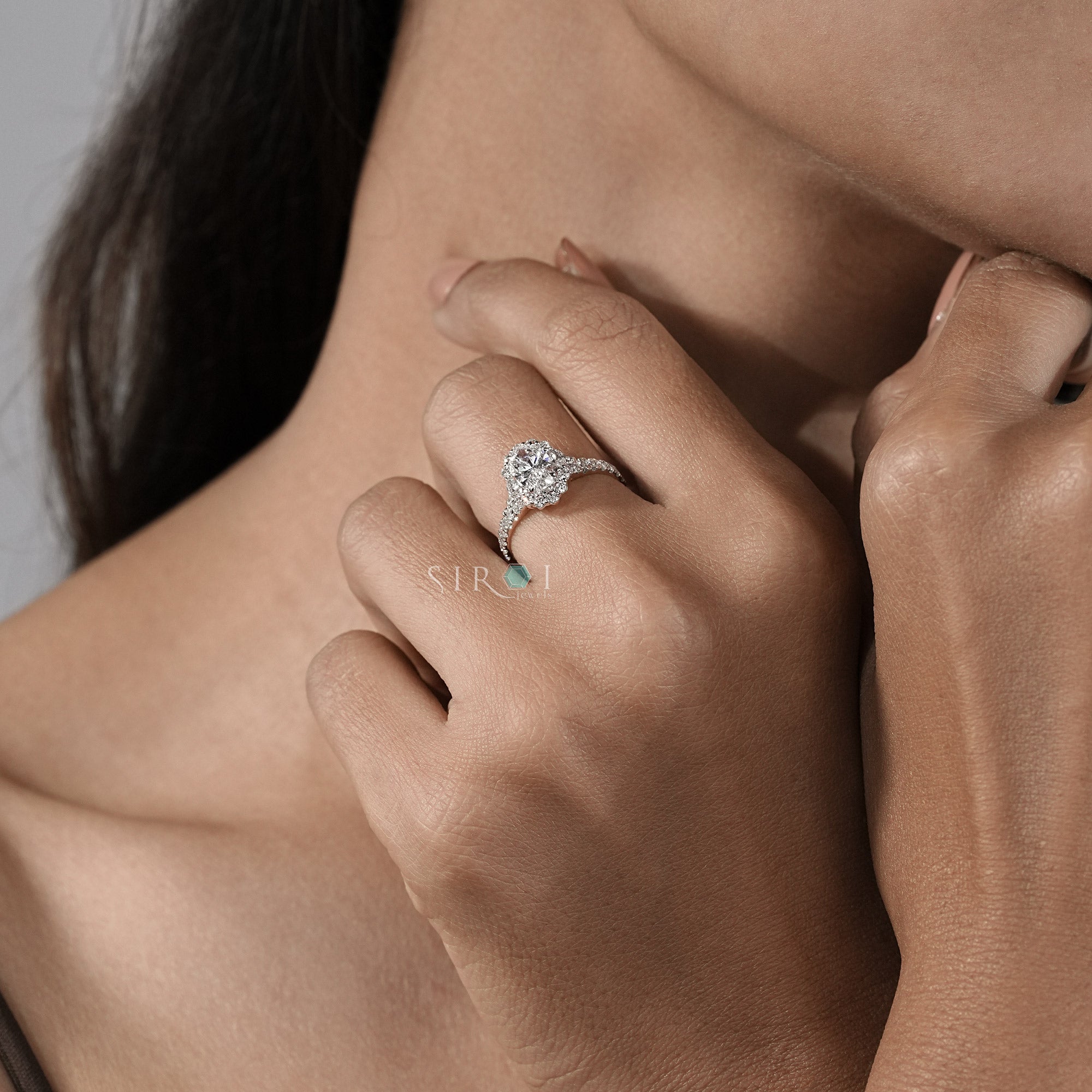Oval Diamond Halo and Two-Stone Engagement Ring in Rose Gold