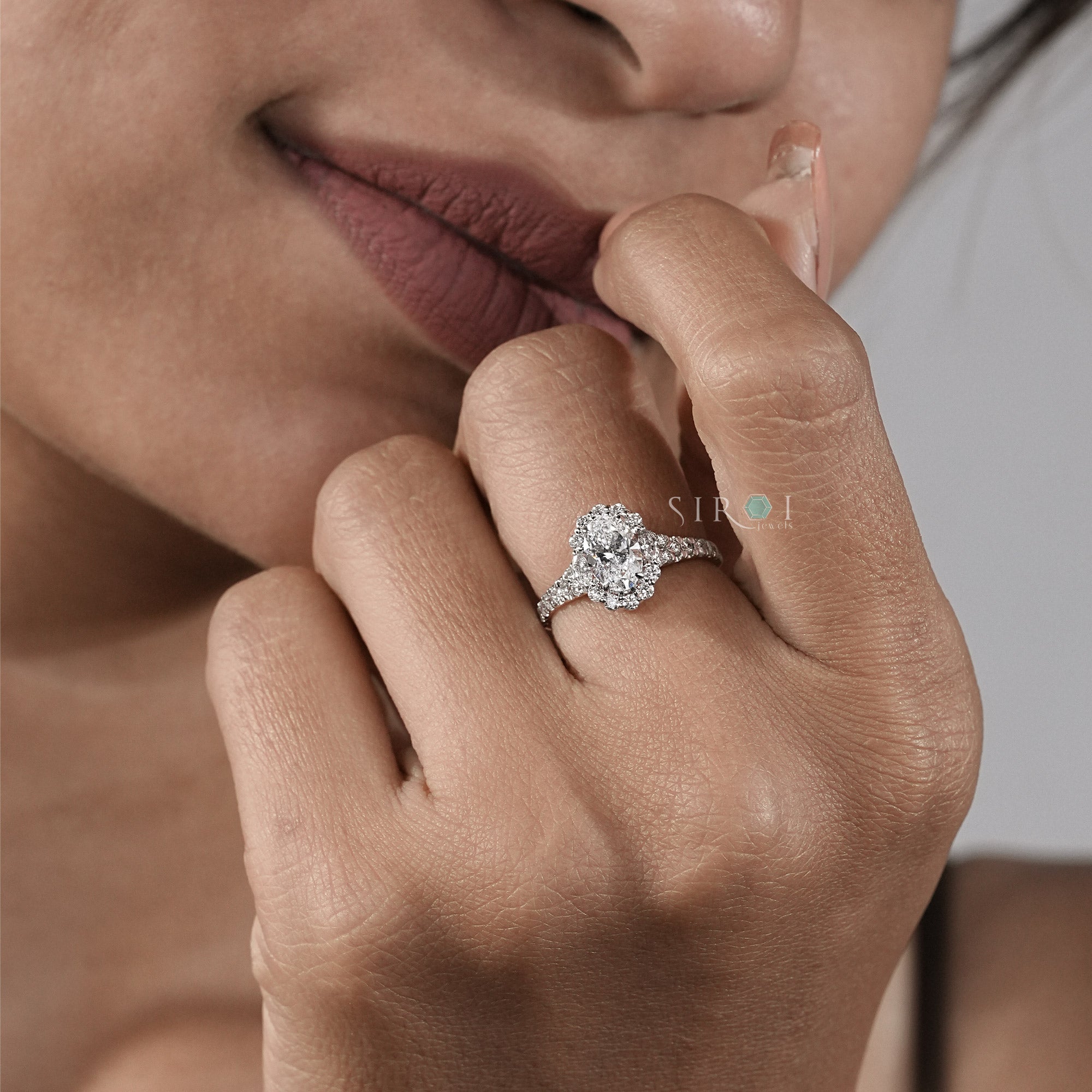 Oval Diamond Halo and Two-Stone Engagement Ring in Rose Gold