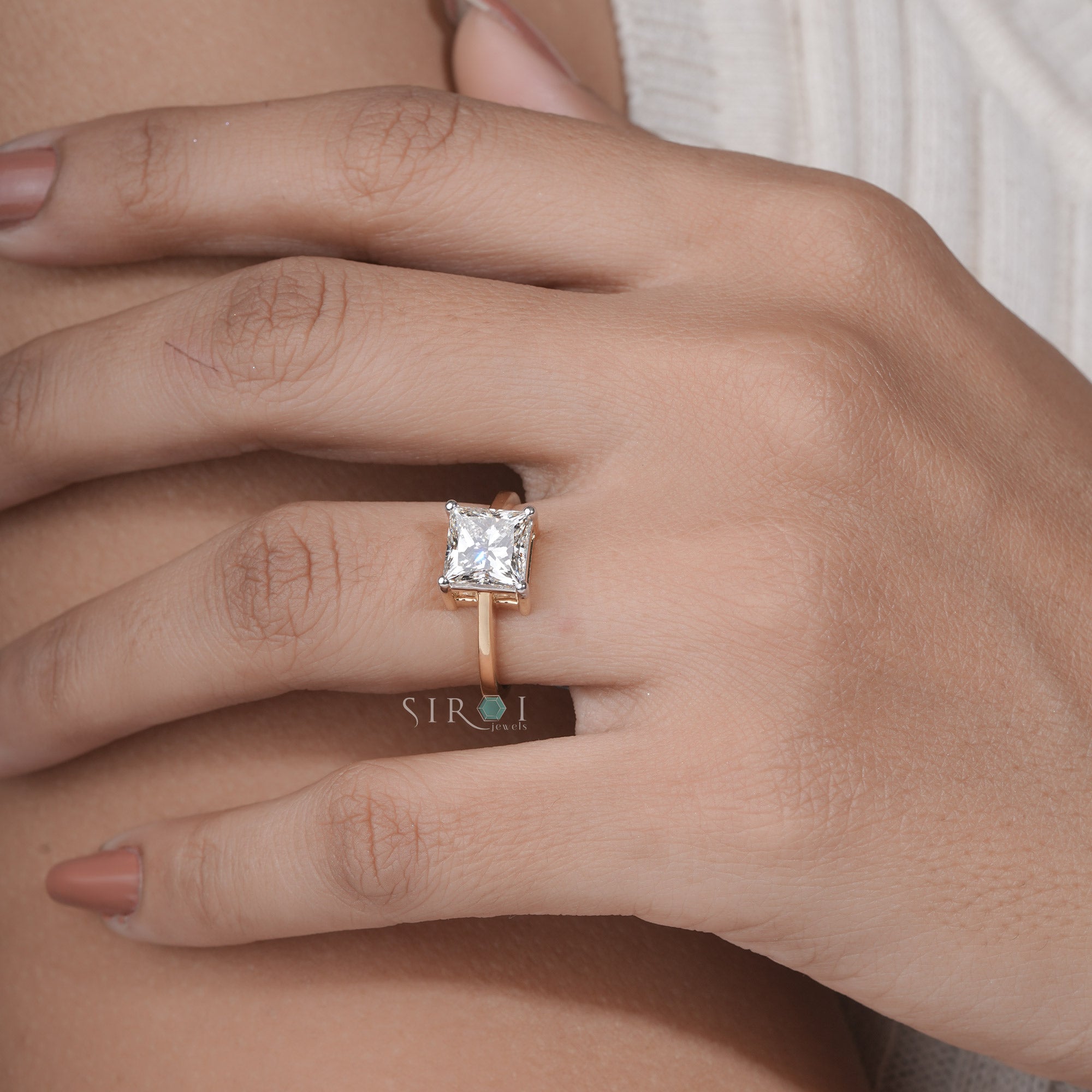 The Eternal Sparkle: Princess Cut Diamond Solitaire with Two-Tone Gold Setting