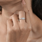 Elegant Pear and Round Three-Stone Diamond Engagement Ring in White Gold