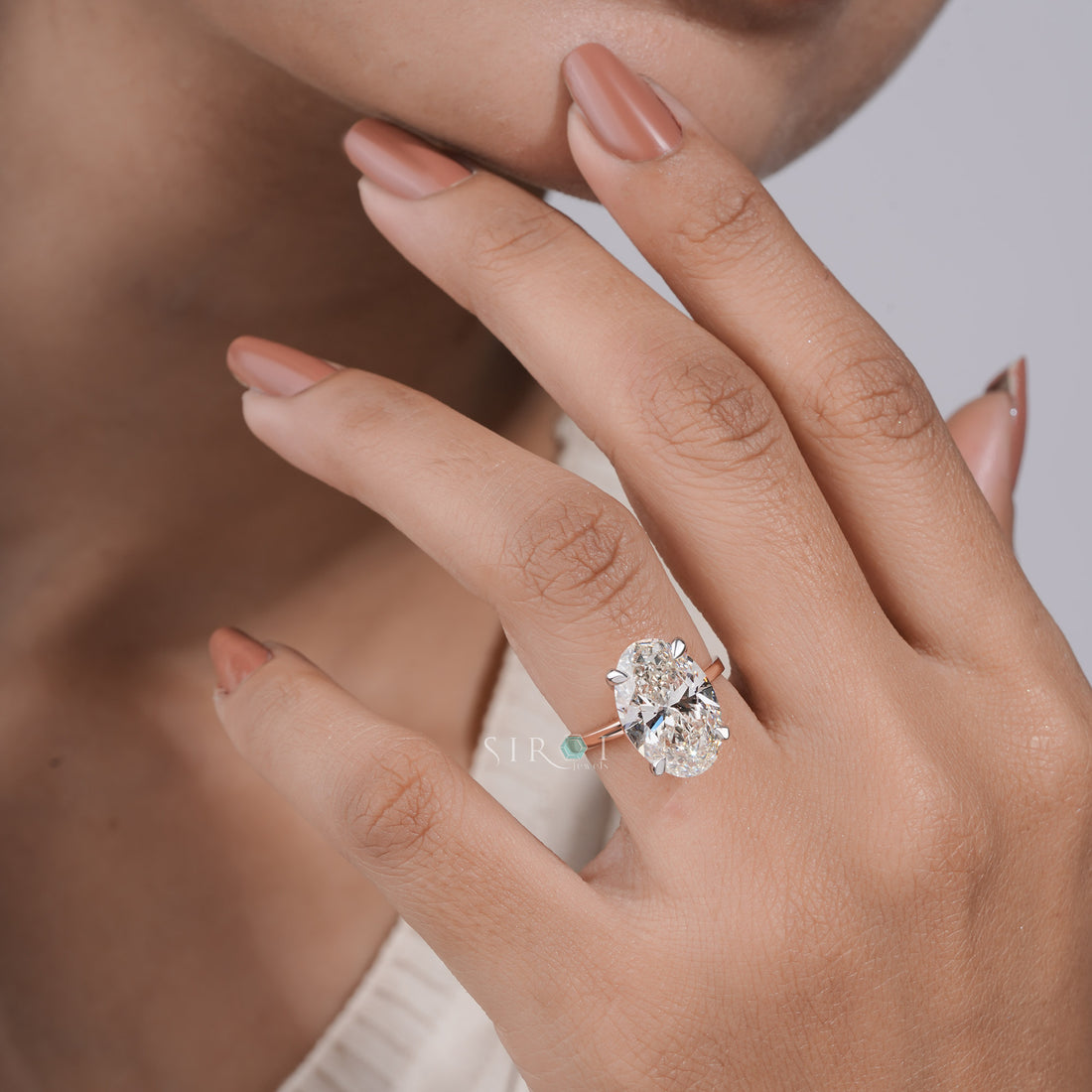 Oval Crushed Ice Solitaire Ring with Petite Claw Prongs
