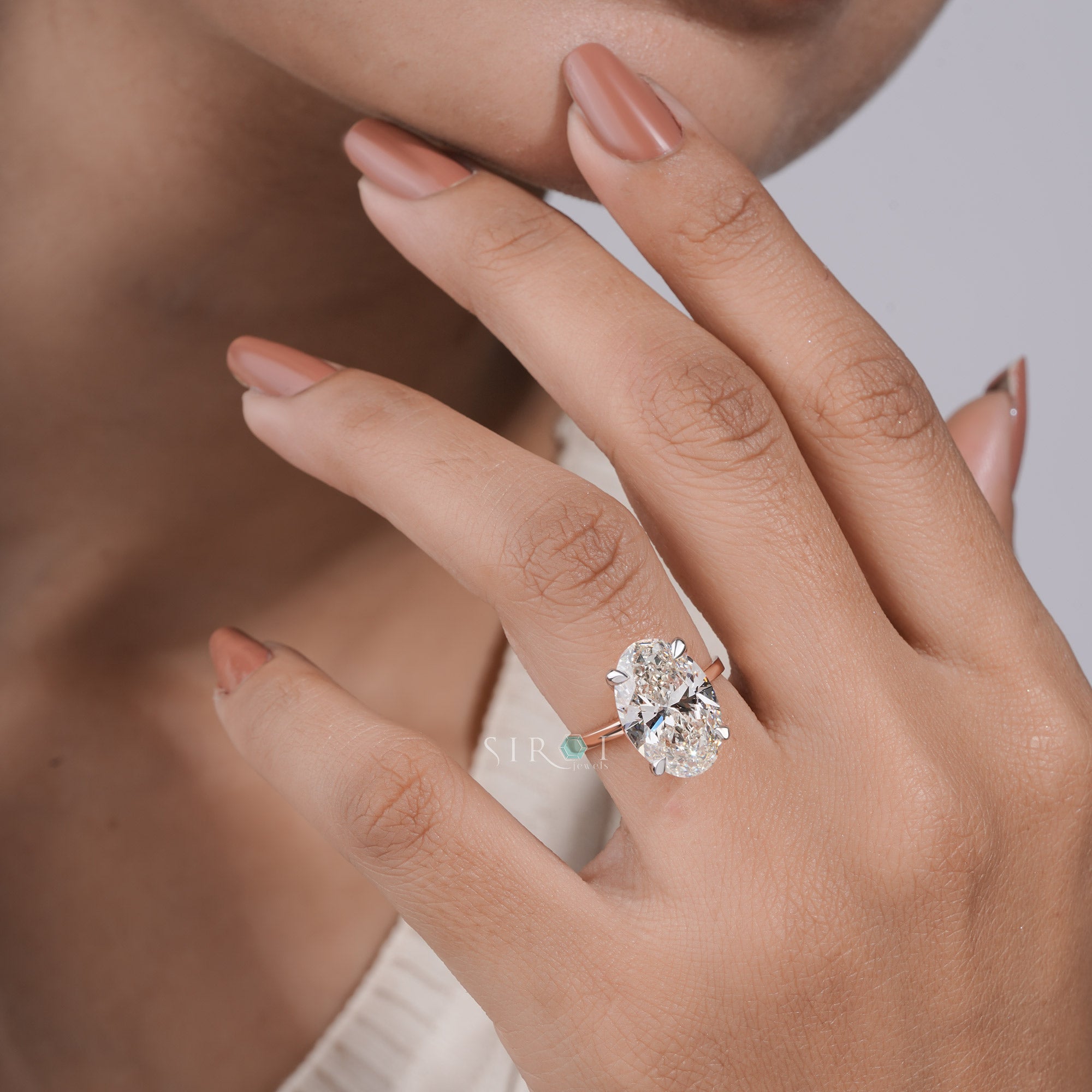 Oval Crushed Ice Solitaire Ring with Petite Claw Prongs