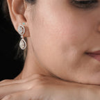 The Aurora Oval & Pear Diamond Halo Drops Earrings
