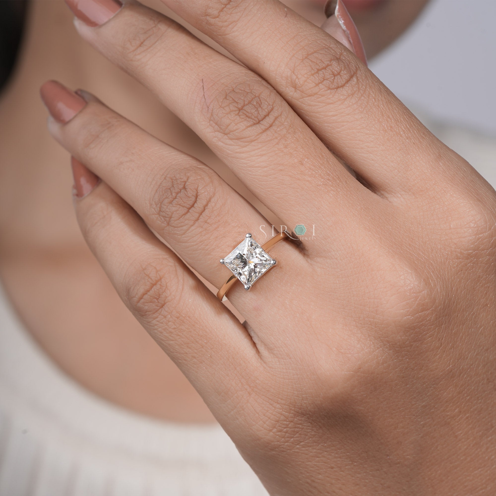 The Eternal Sparkle: Princess Cut Diamond Solitaire with Two-Tone Gold Setting