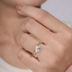 "Unique Pear Diamond Solitaire with Wavy Band"