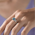 Princess Cut Blue Topaz and Diamond Three-Stone Engagement Ring in White Gold