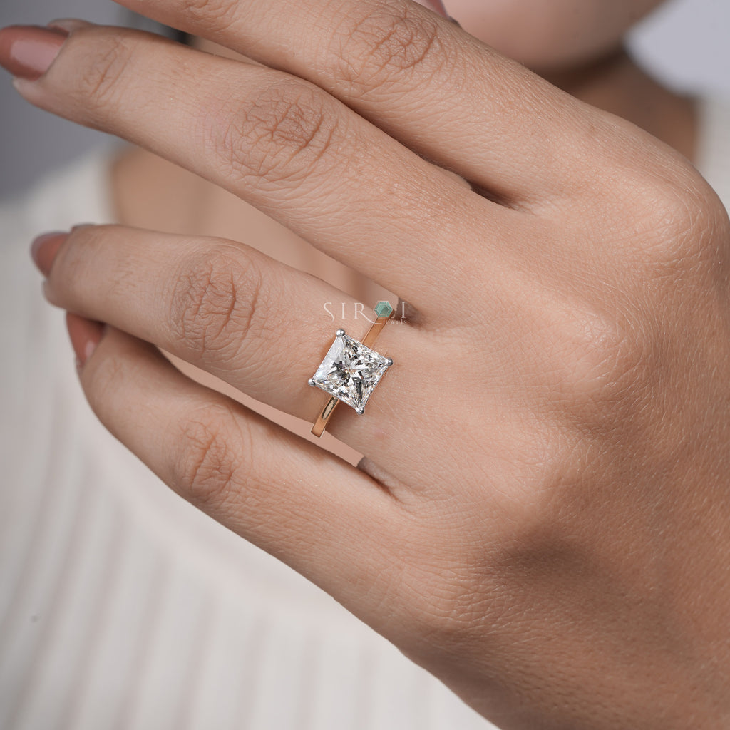 The Eternal Sparkle: Princess Cut Diamond Solitaire with Two-Tone Gold Setting